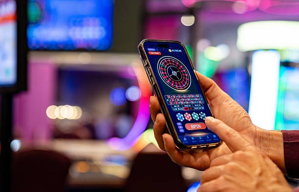 iwan togel platform showing live-dealer tables and sportsbook interface on mobile
